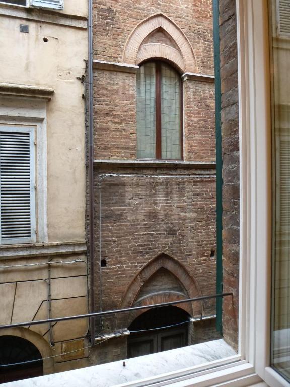 B&B Quattro Cantoni Siena Szoba fotó