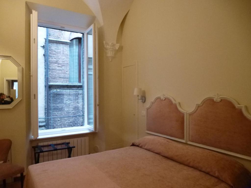 B&B Quattro Cantoni Siena Szoba fotó